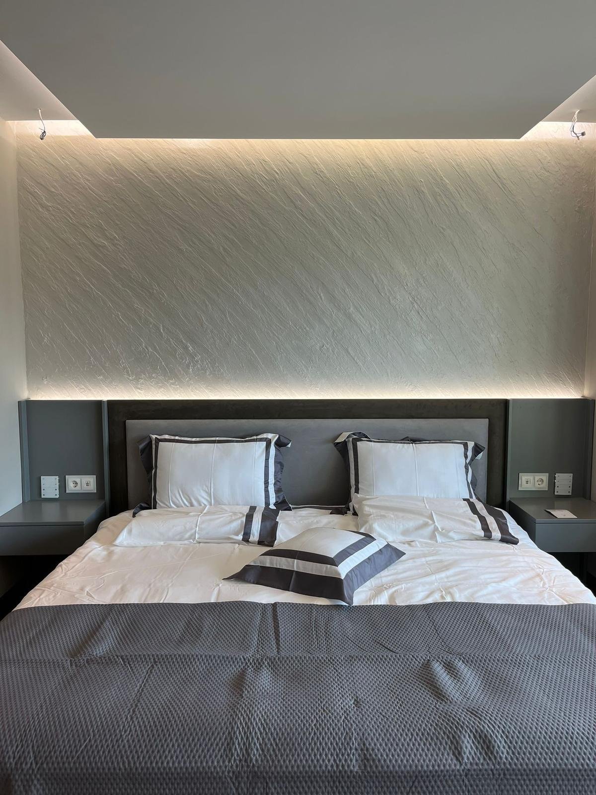 Custom bedroom headboard with integrated LED lighting